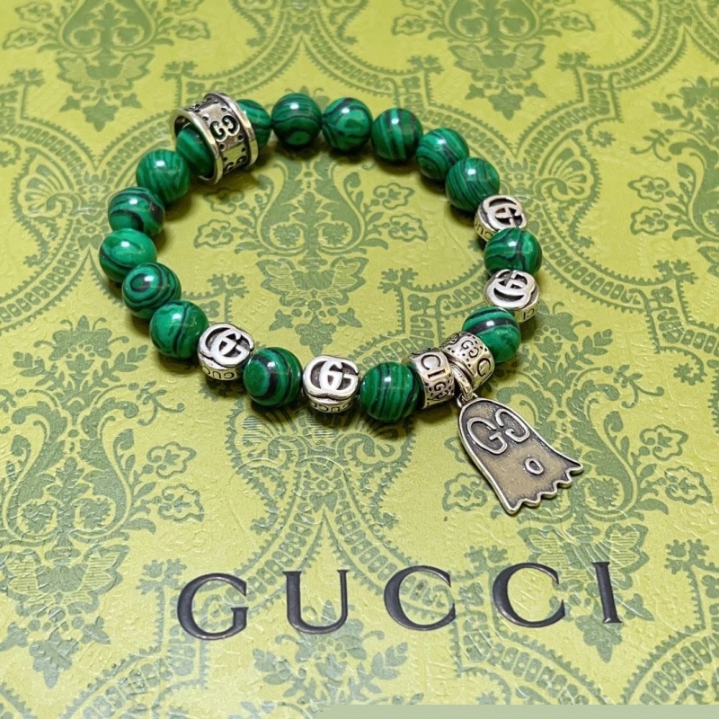 G*u*i bracelets